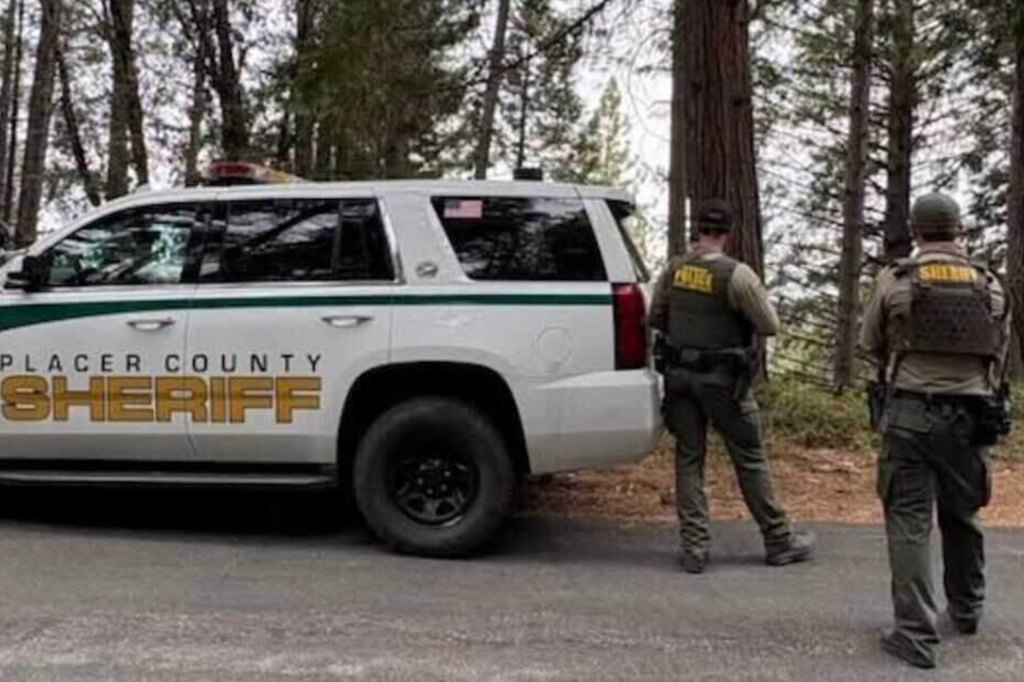 Placer County Sheriff vehicle with two officers in uniform.