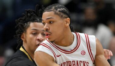 Mar 15, 2026; Nashville, TN, USA; Arkansas Razorbacks guard Darius Acuff Jr. (5) dribbles the ball defended by Vanderbilt Commodores guard Chandler Bing (7) in the second half during the men's SEC Conference Tournament Championship at Bridgestone Arena. Mandatory Credit: Steve Roberts-Imagn Images