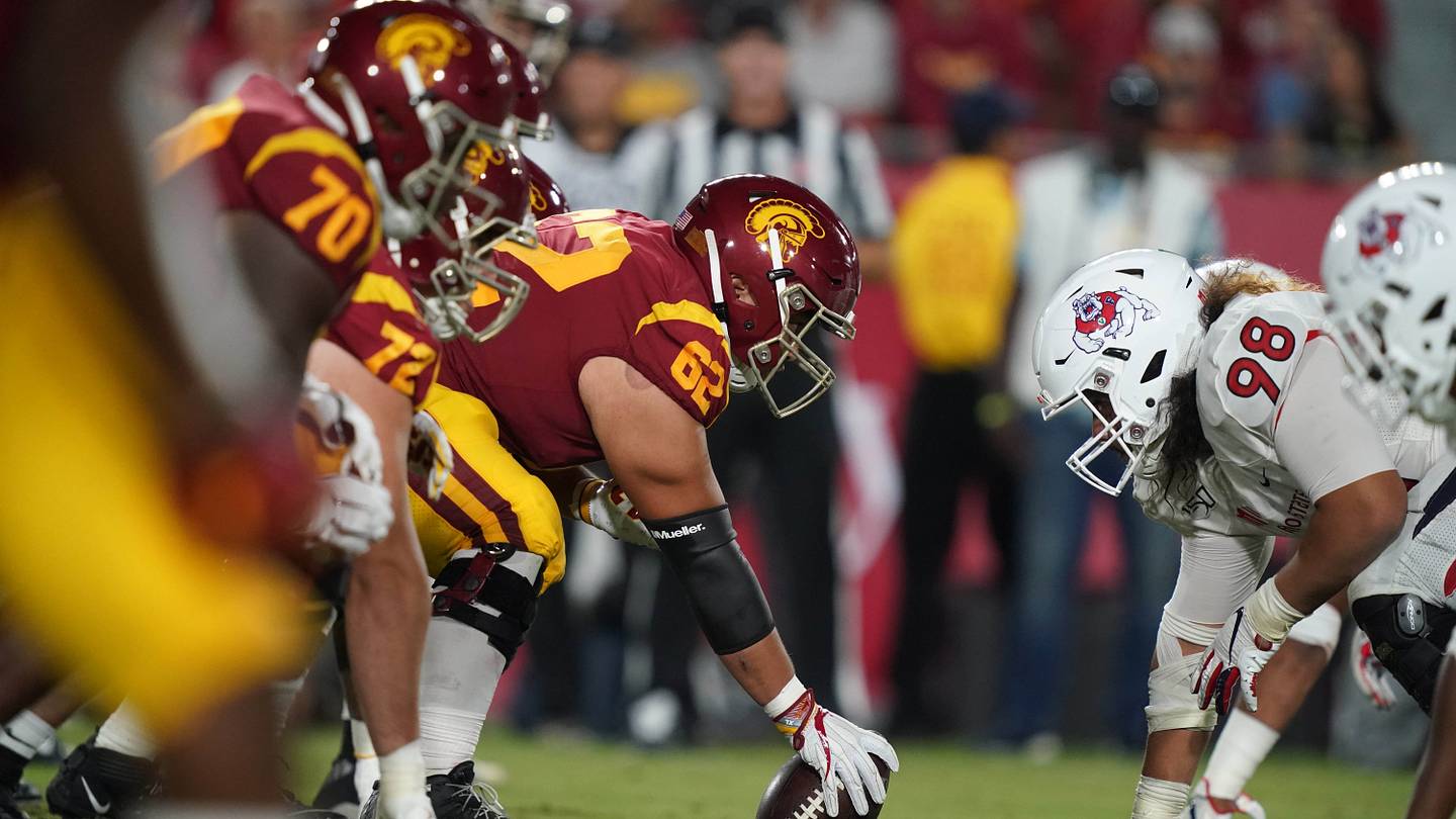 Aug 31, 2019; Los Angeles, CA, USA; General overall view as Southern California Trojans center Brett Neilon (62) snaps the ball against Fresno State Bulldogs defensive tackle Keiti Iakopo (98) at the line of scrimmage uat Los Angeles Memorial Coliseum. USC defeated Fresno State 31-23.  Mandatory Credit: Kirby Lee-USA TODAY Sports