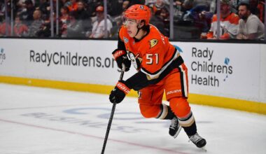 Mar 22, 2026; Anaheim, California, USA; Anaheim Ducks defenseman Olen Zellweger (51) moves the puck against the Buffalo Sabres during the first period at Honda Center. Mandatory Credit: Gary A. Vasquez-Imagn Images