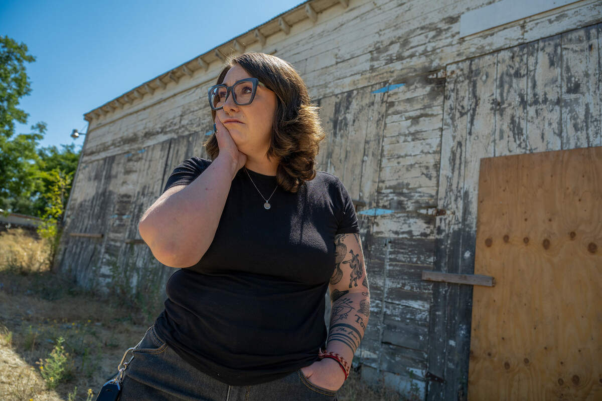 Jenna Mozdy, 38, pauses to consider where else to look for her friend Califia Carlisle after searching abandoned buildings along Kiefer Boulevard in Sacramento County in August. Mozdy and Carlisle did drugs together at Sacramento State, but Mozdy escaped addiction and is now a drug counselor.