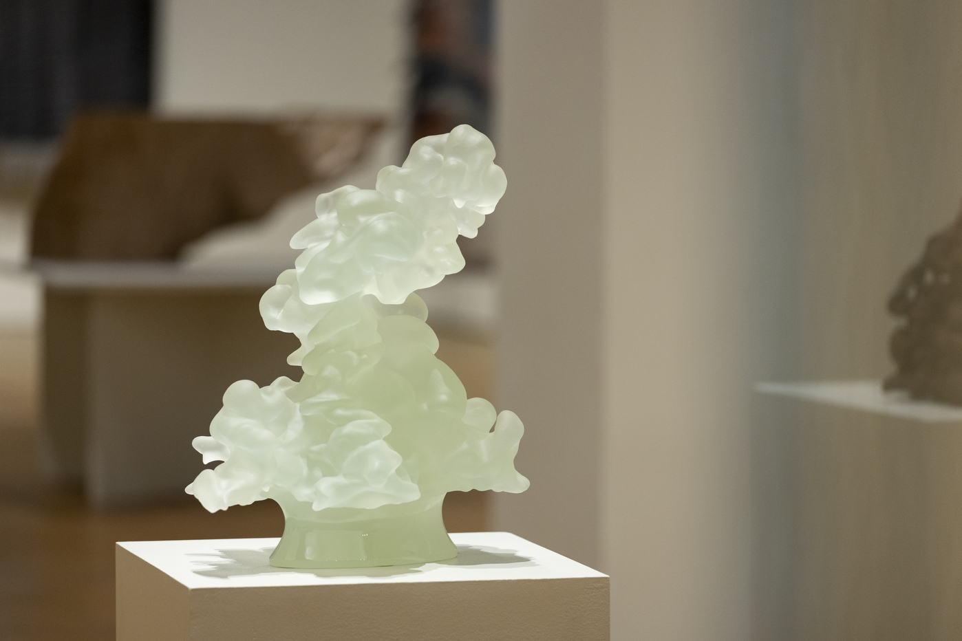 A translucent crystalline sculpture by Karen LaMonte is displayed at the Mills College Art Museum.
