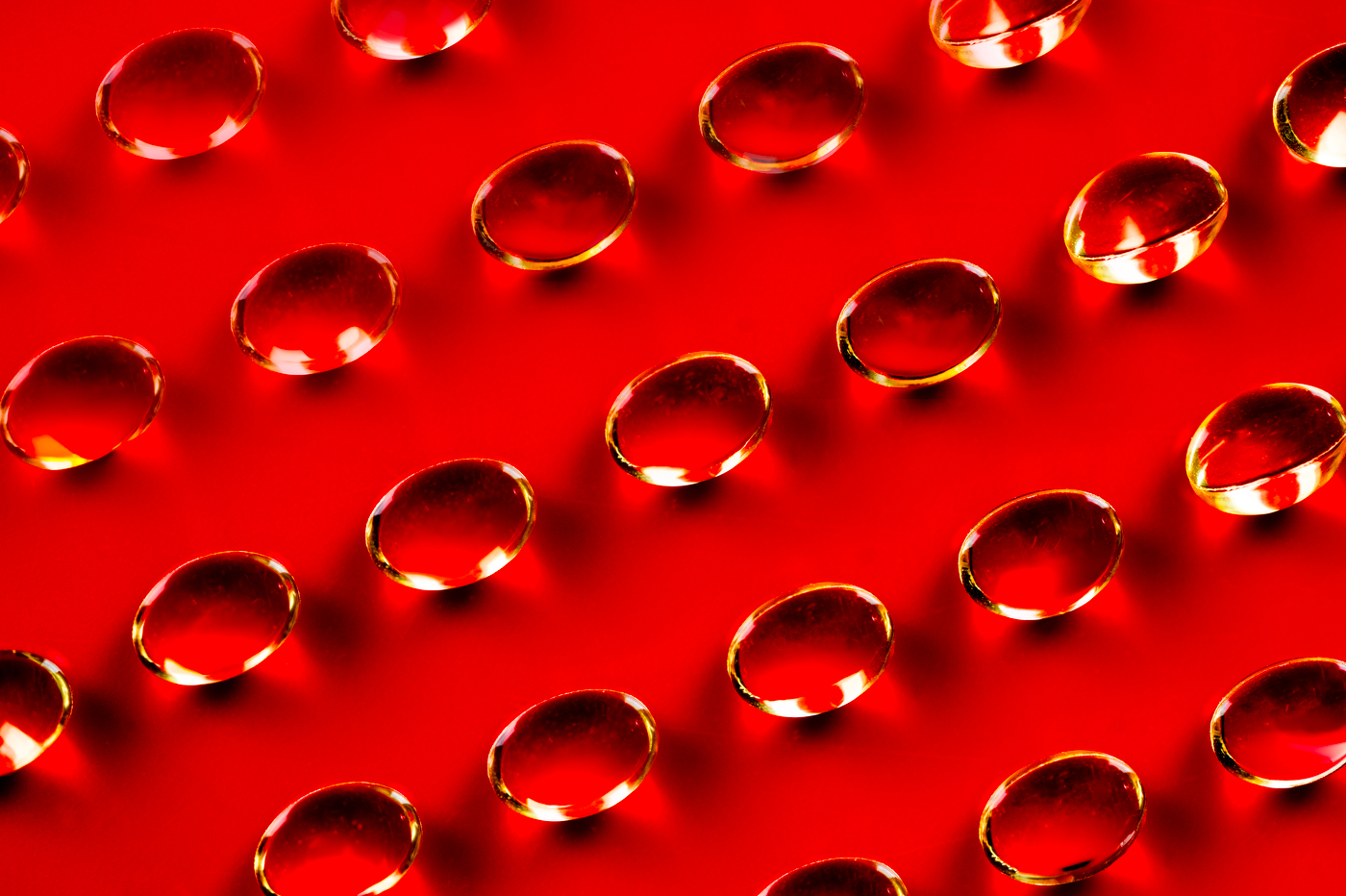 A close up of rows of liquid droplets.