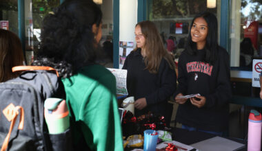Students talk during an election tabling event.
