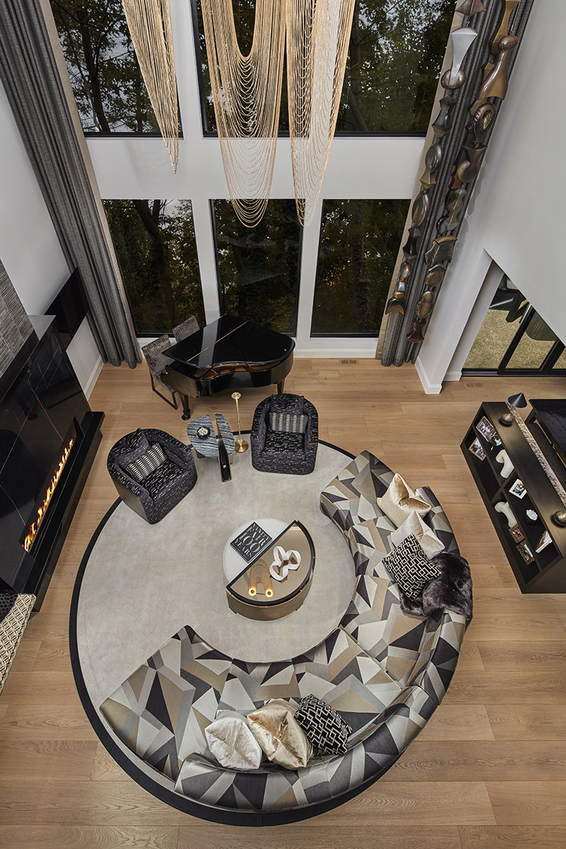 An aerial view of a luxe living room inside an Oakland Township home.