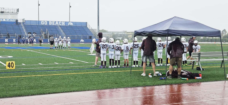 Game Captains Alexander Virzera (17), Danny Eng (16), Braden Connolly (72) and Branson Pepicelli (7) walk up for the coin toss to start the game. Game Captains Alexander Virzera (17), Danny Eng (16), Braden Connolly (72) and Branson Pepicelli (7) walk up for the coin toss to start the game.