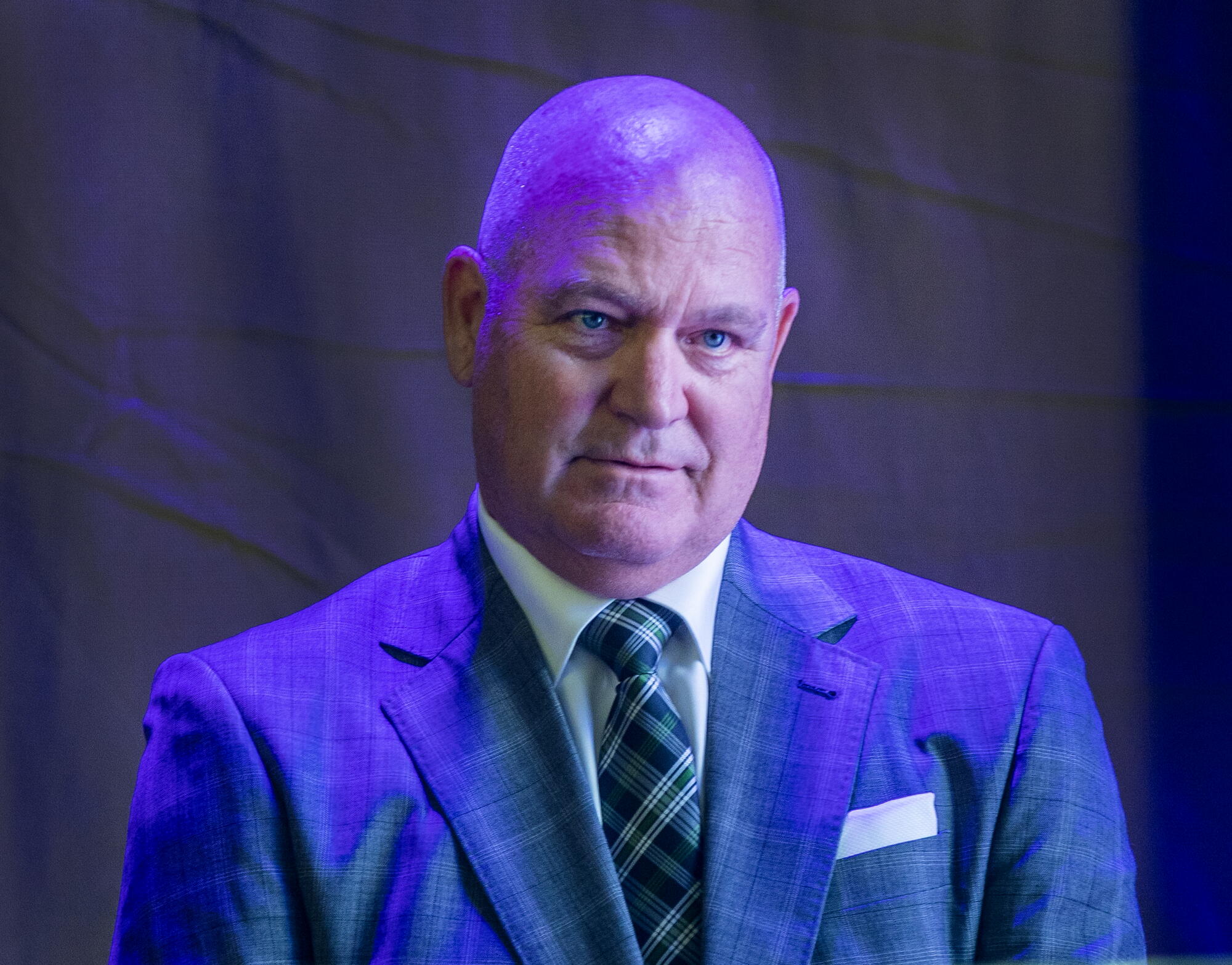 Tim Harris, the former president of business operations for the Lakers watches during a news conference.