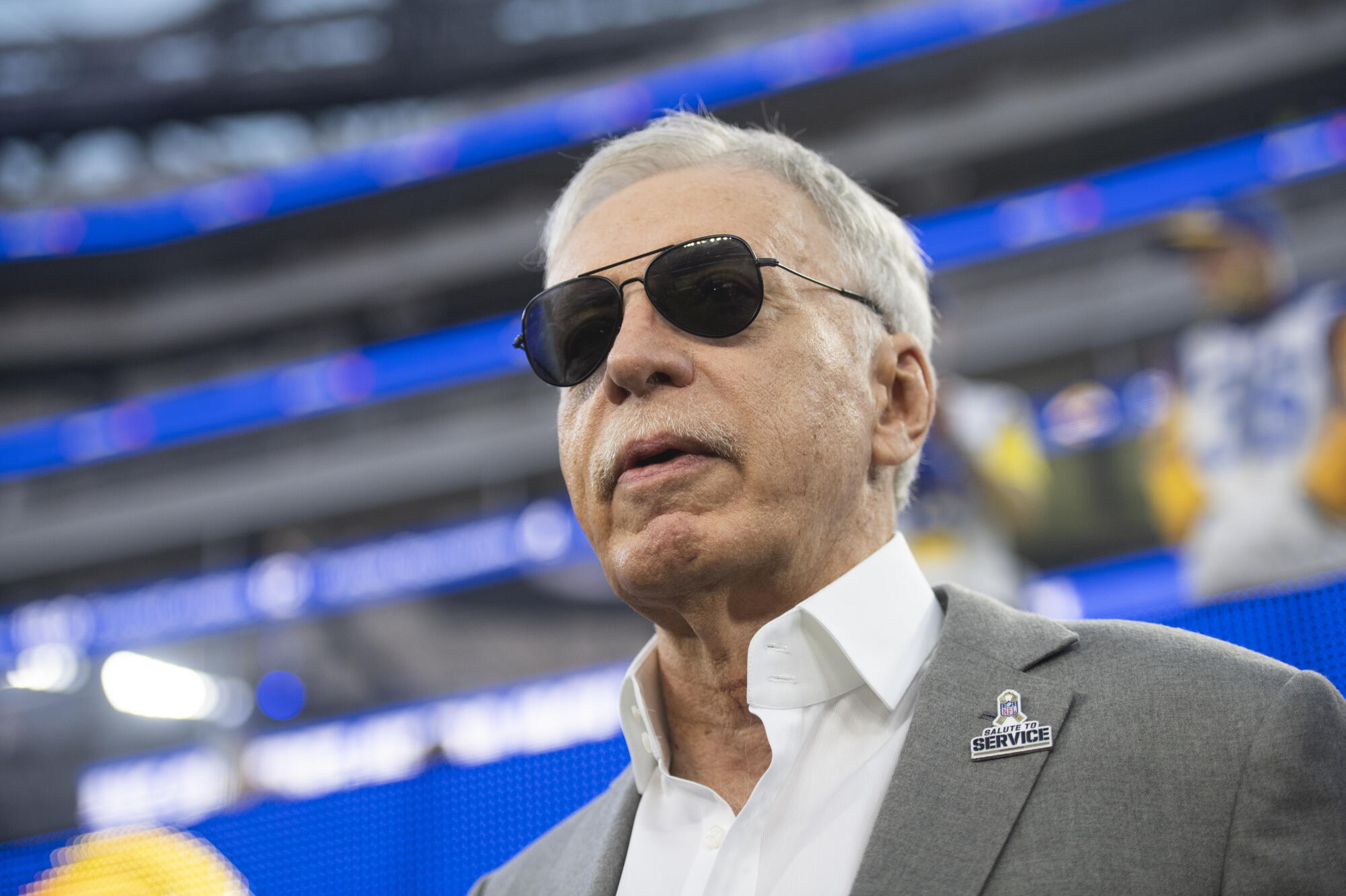Rams owner Stan Kroenke walks on the field during a game against the Tennessee Titans on Nov. 7, 2021.