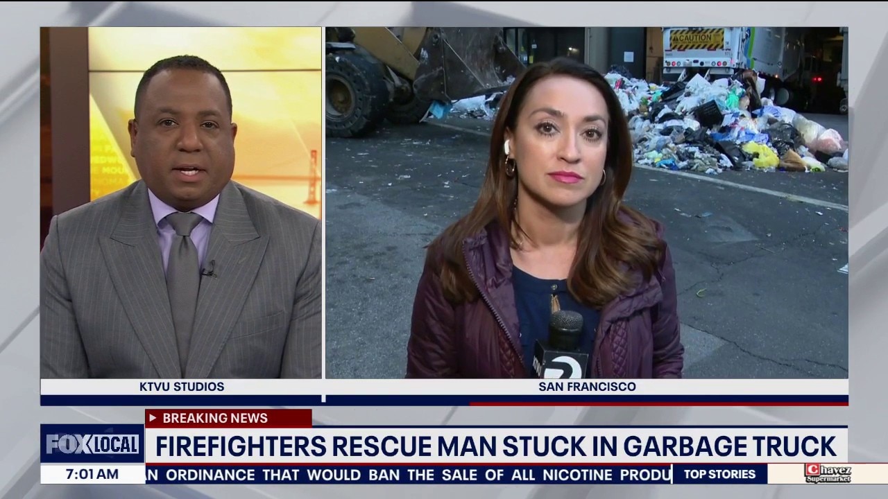 San Francisco Firefighters rescue man trapped in garbage truck