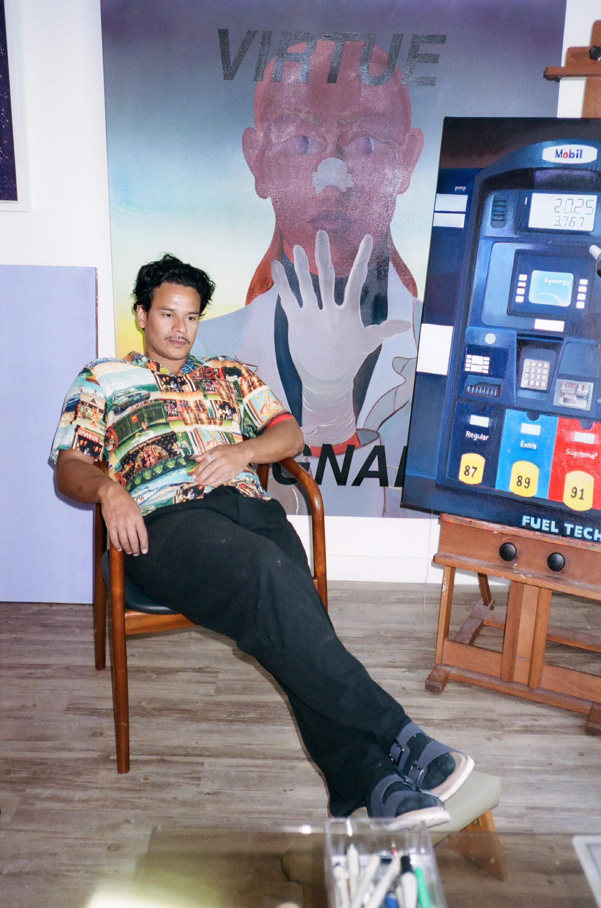 Jonny Negron in his Los Feliz studio featuring works in progress "virtue signal" and "tellurian lube."