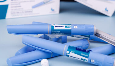 A pile of blue, injectable medication with the Ozempic name on it.