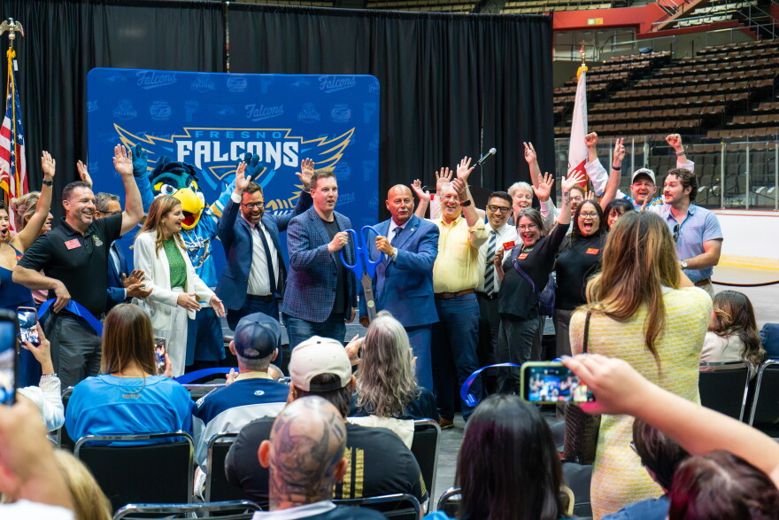 Fresno Falcons President Jimmy Fries and Mayor Jerry Dyer stand alongside other city leaders for the ribbon-cutting.