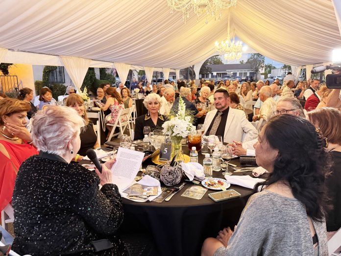 Supporters gather to celebrate Los Al’s ‘Miracle on Reagan Street’ as St. Isidore turns 100