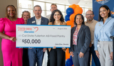 Representatives from Cal State Fullerton, Associated Students Inc. and Stater Bros. Charities present a $50,000 check for the ASI Food Pantry.