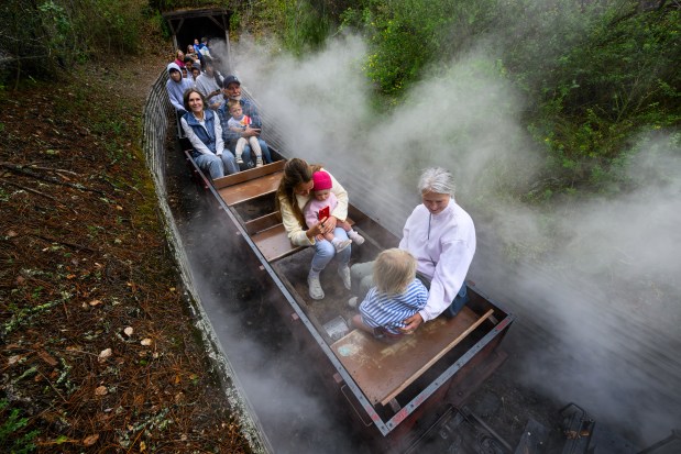 Passengers exit a tunnel as they ride a steam train at the Redwood Valley Railway at Tilden Regional Park in Orinda, Calif., on Monday, Aug. 31, 2026. Visitors are treated to a 12-15 minute ride on a 15-inch gauge track which was built back in 1952. (Jose Carlos Fajardo/Bay Area News Group)