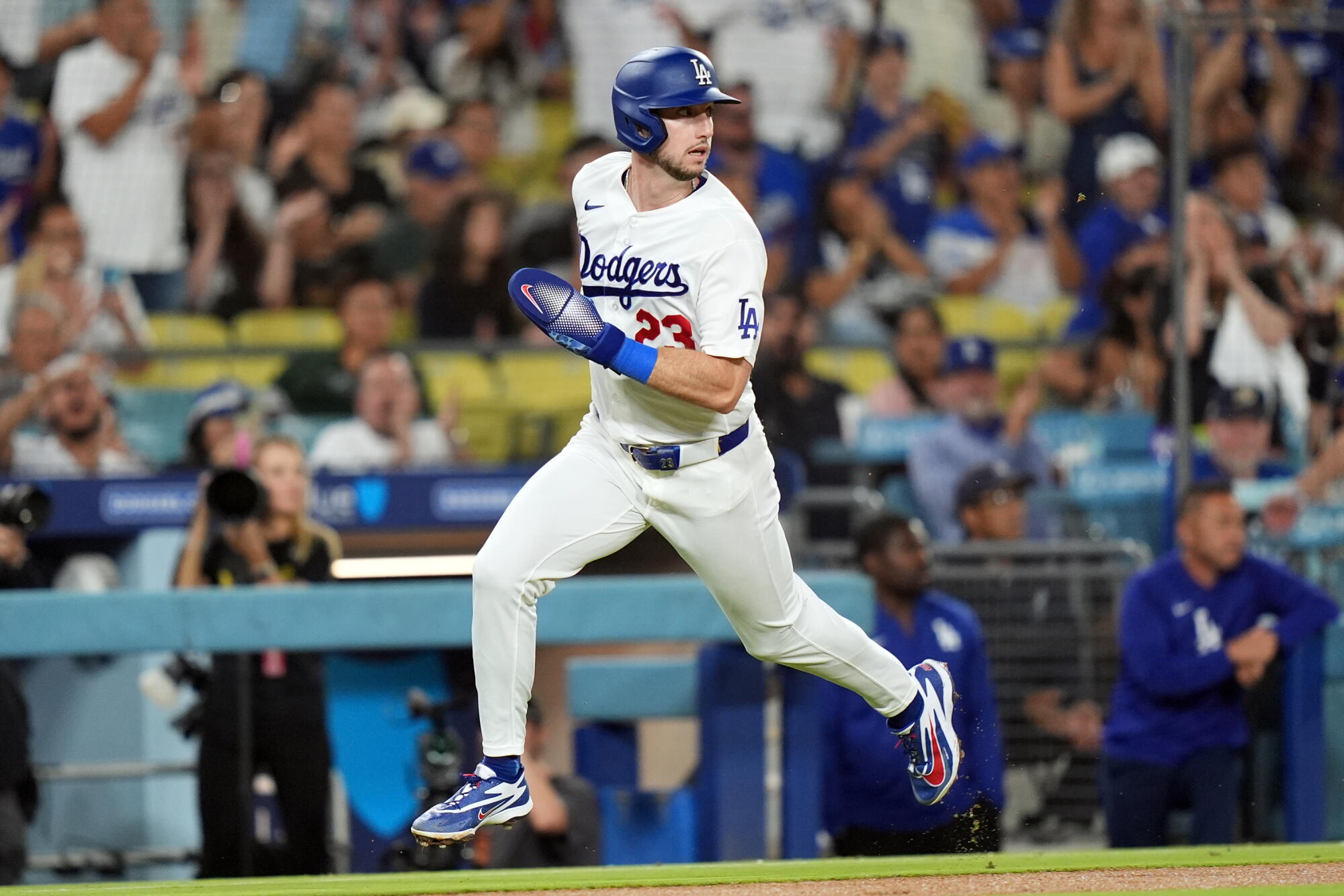 Kyle Tucker scores on a single by Mookie Betts in the Dodgers' 5-3 win over the Washington Nationals.