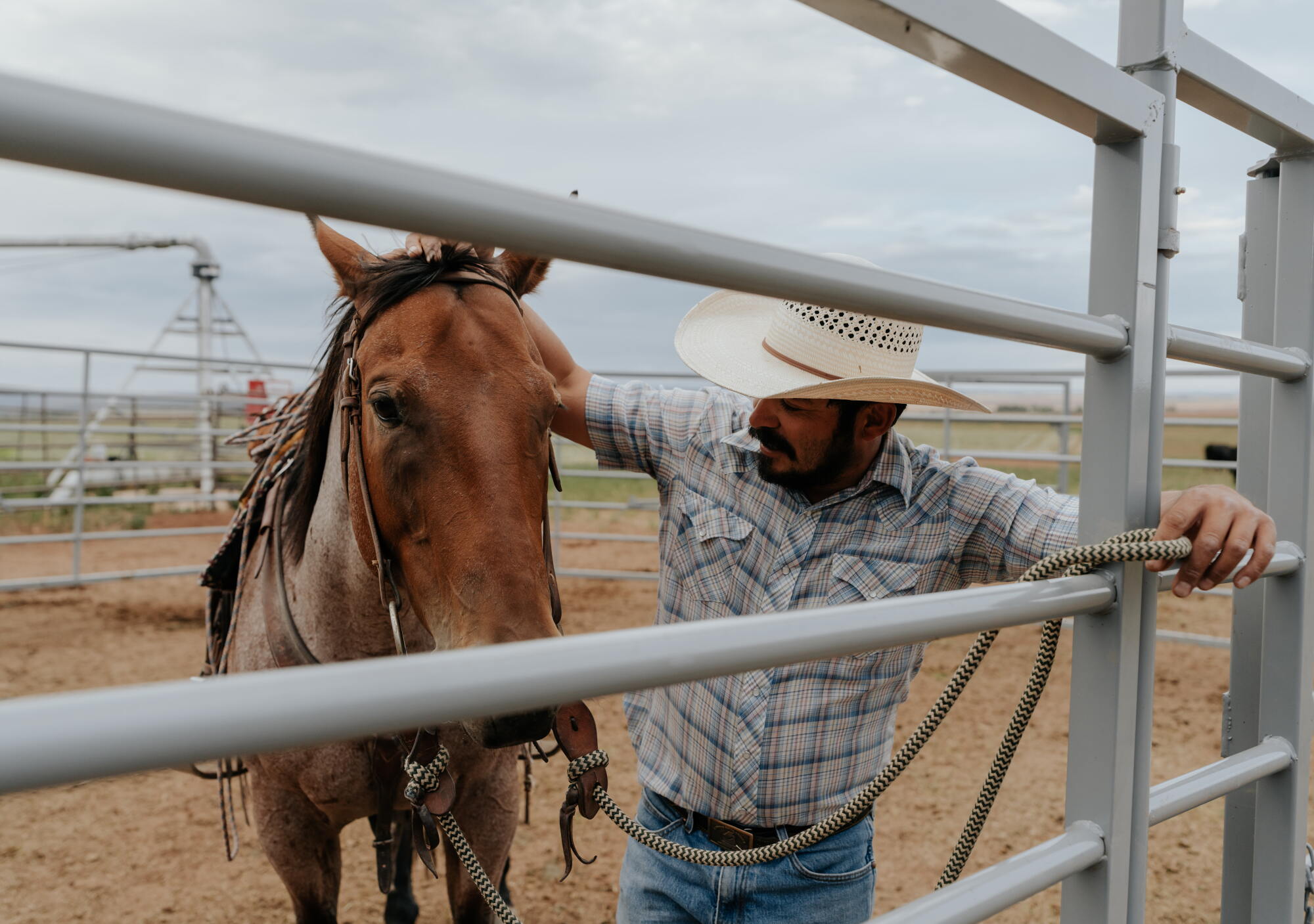 Colorado rancher Caleb Valdez with his horse, Streak.