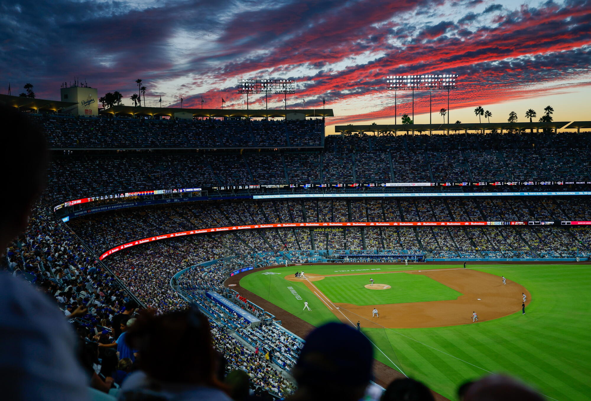 The sun sets during the Dodgers' win over the Washington Nationals at Dodger Stadium on Saturday.