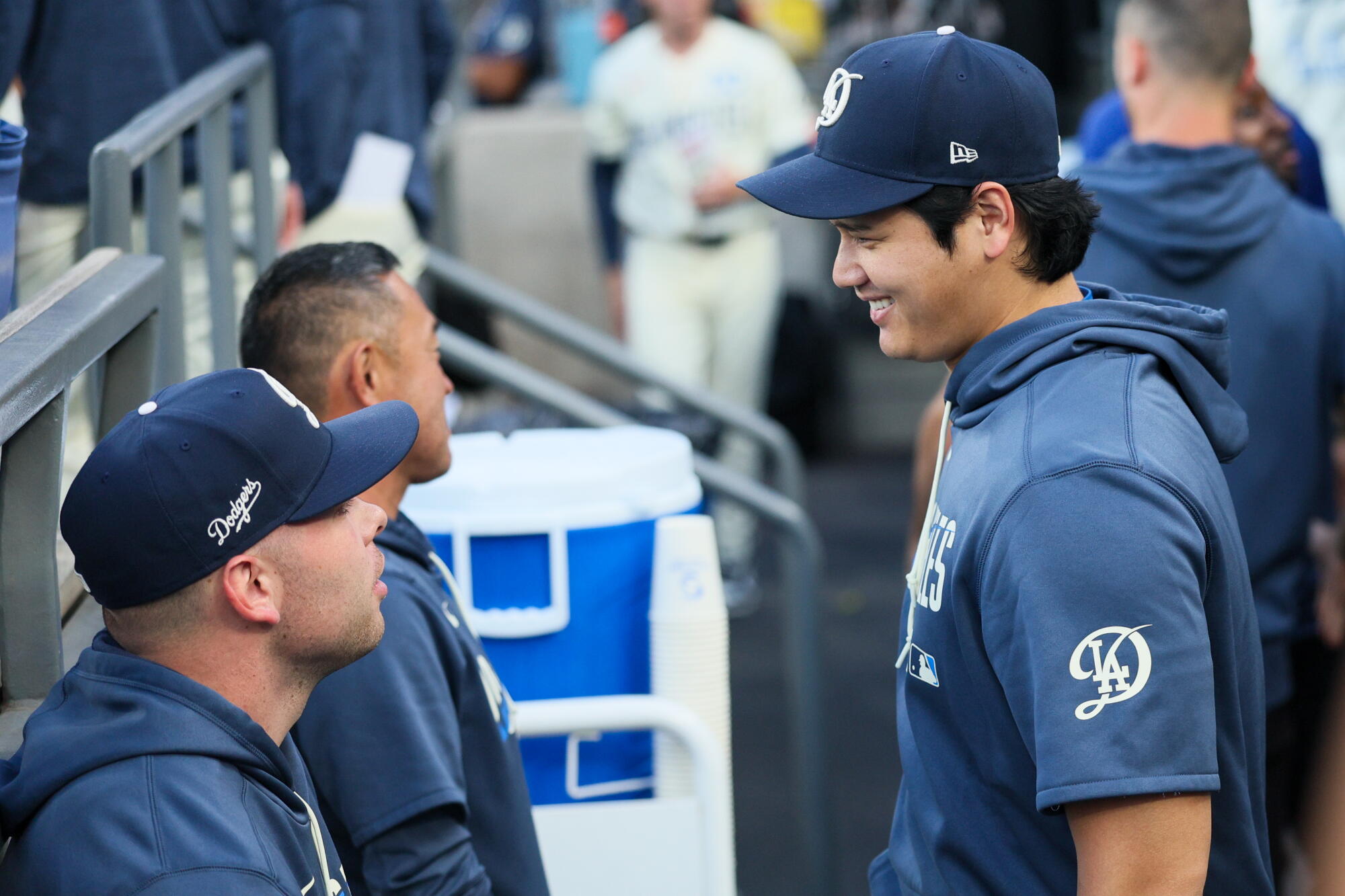 Dodgers star Shohei Ohtani, right, speaks with catcher Dalton Rushing during the first inning Saturday.