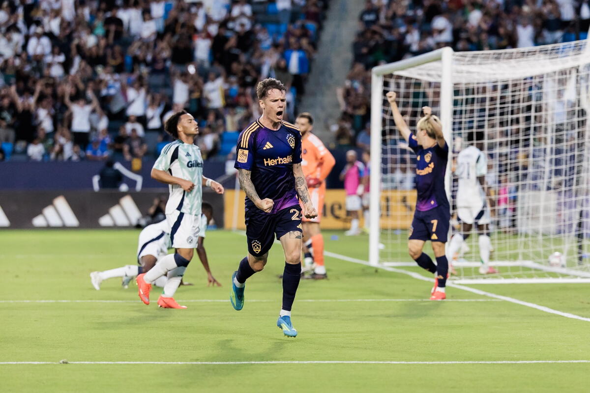 Galaxy forward Robert Taylor celebrates after scoring against the New England Revolution at Dignity Health Sports Park.