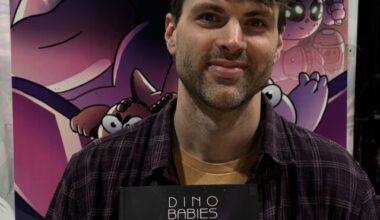 Matt Bolinger holding Dino Babies in Space