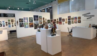 Wide view of the Laluzapalooza 2026 exhibition at La Luz de Jesus Gallery, featuring colorful artwork displayed across gallery walls and pedestals.
