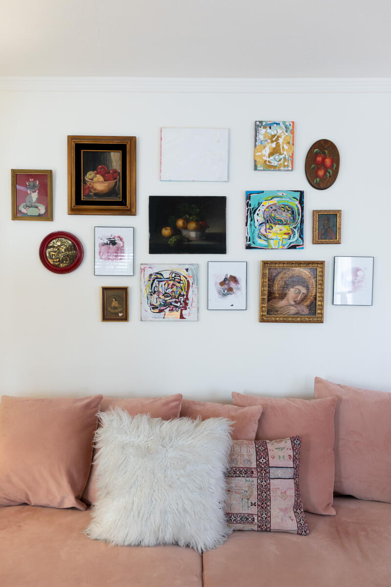 Morgan Jordan's art pieces above her couch in her home.