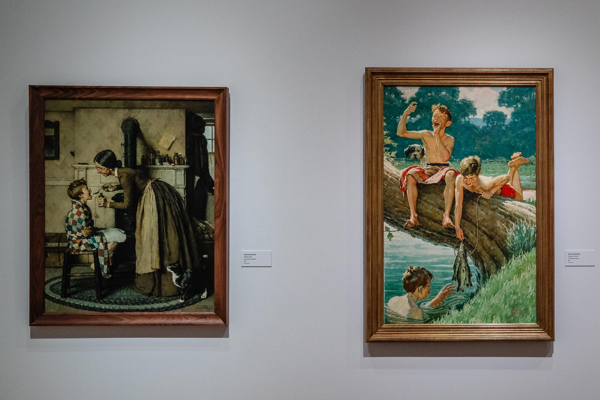 Two works by Norman Rockwell in a museum.