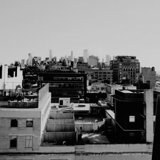 A black and white view of a skyline
