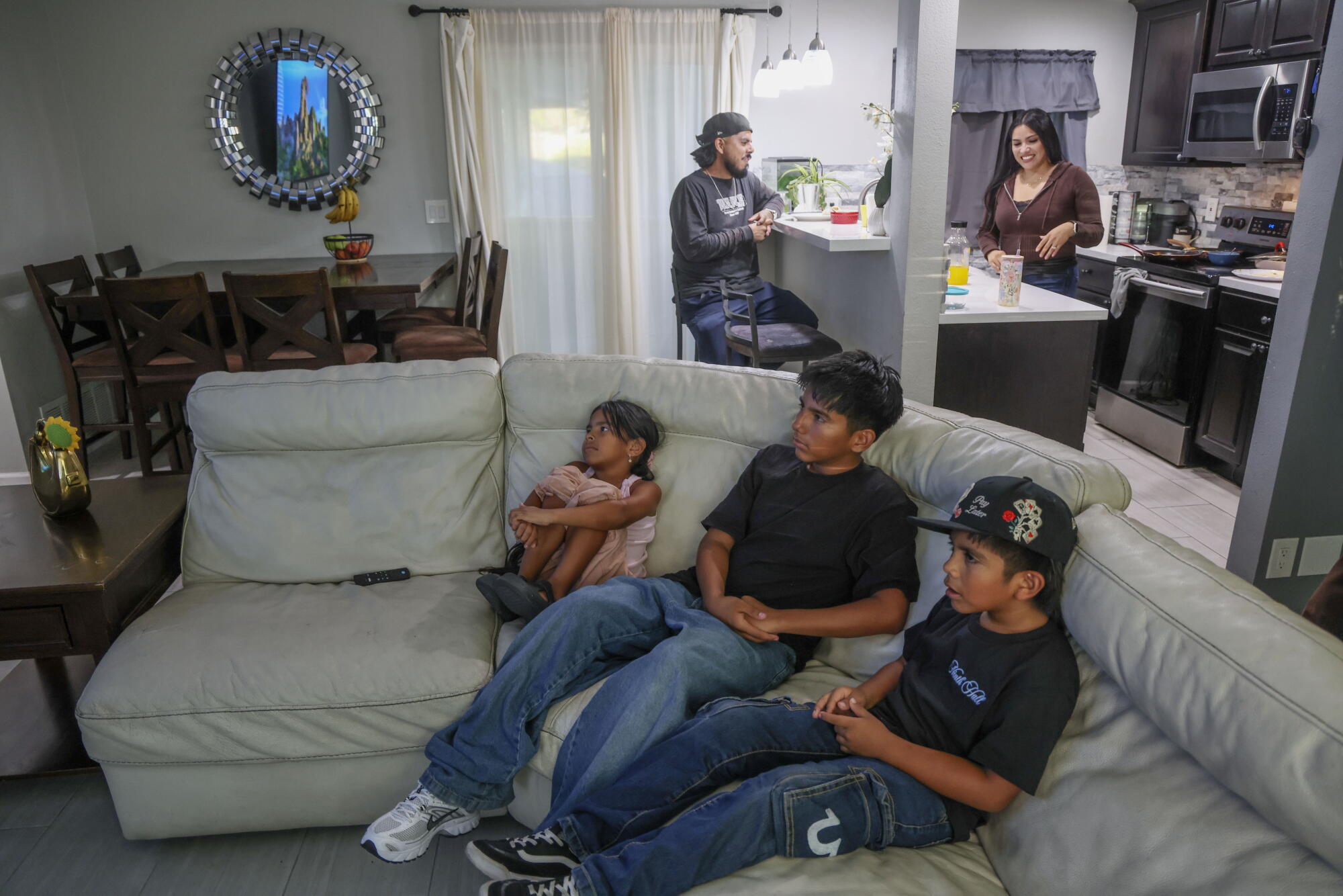 Angel Olea at home with his wife Estephanie, and kids Ruby, 6, Isaac,7, and Angel III, 13 at their apartment