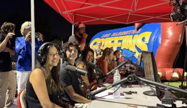 Los Alamitos High School students work behind the microphones during the school’s first student-produced live varsity football broadcast on Sept. 4.