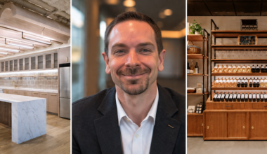 Corey Farnsworth, CEO of Architectural Wood Design, centered between examples of the company’s custom commercial millwork.