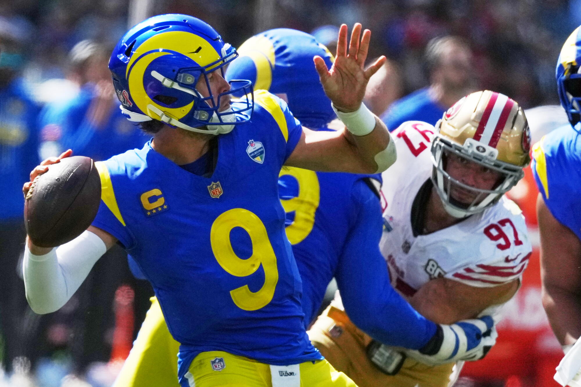 Rams quarterback Matthew Stafford passes against the San Francisco 49ers in the first half.