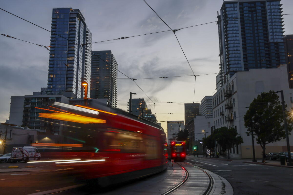 The San Diego Trolly passes condominium complexes in downtown San Diego.
