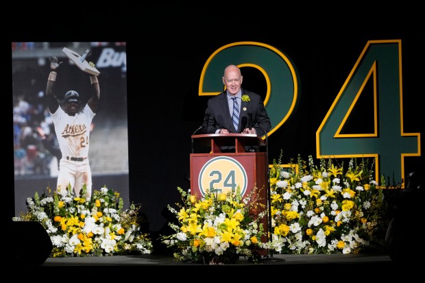 Former Oakland Athletics general manager Sandy Alderson speaks during a celebration of life for former Athletics baseball player Rickey Henderson in Oakland, Calif., Saturday, Feb. 1, 2025. (AP Photo/Jeff Chiu)