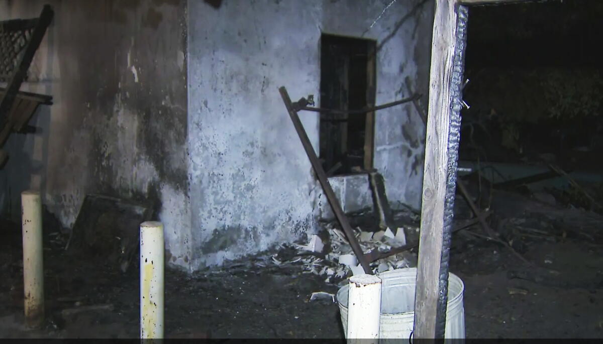 Fire damage is seen at an abandoned Studio City property following a overnight blaze