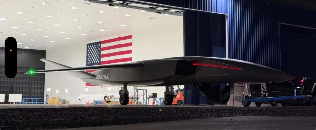 Aevum RAVN X registered N567RX in a hangar doorway at Long Beach Airport