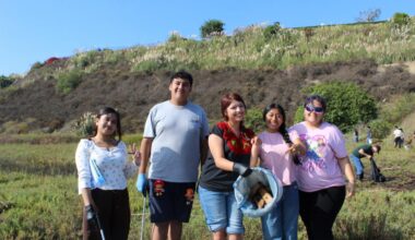 Volunteers take part in a previous California Coastal Cleanup Day at Upper Newport Bay in Newport Beach.
