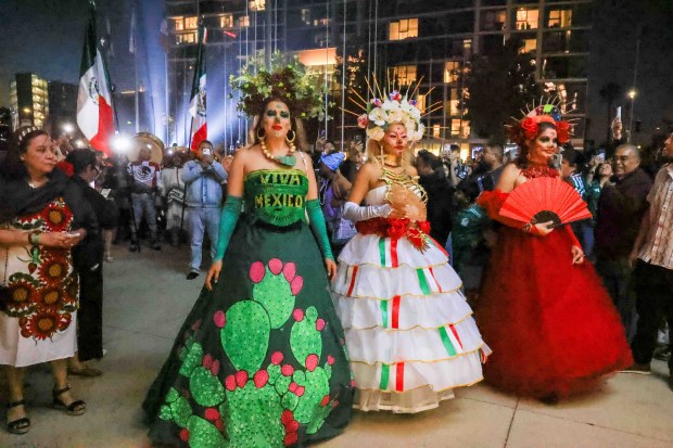 Hundreds of attendees dressed in patriotic colors and costumes gather for "El Grito," or "The Cry," delivered by Consul General Neftali Said Pérez González during the 216th anniversary of Mexican Independence Day celebrations at San Jose City Hall in San Jose, Calif., on Tuesday, Sept. 15, 2026. (Ray Chavez/Bay Area News Group)