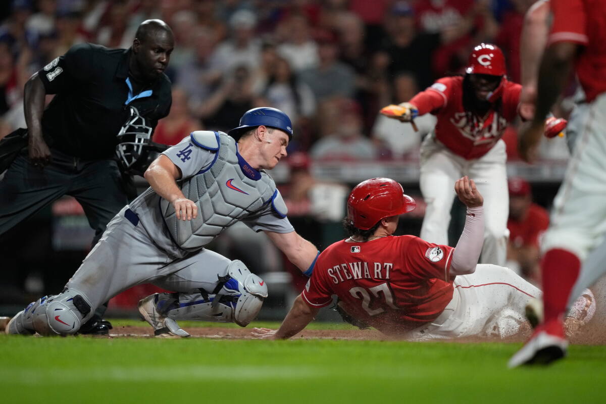 Sal Stewart is out at home plate as Will Smith reaches with the tag in the seventh inning Wednesday.