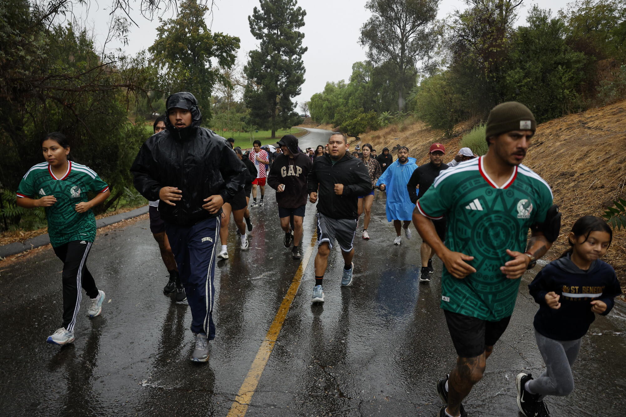 Participants take part in the Barrio Athletics 5K Run at Elysian Park earlier this month.