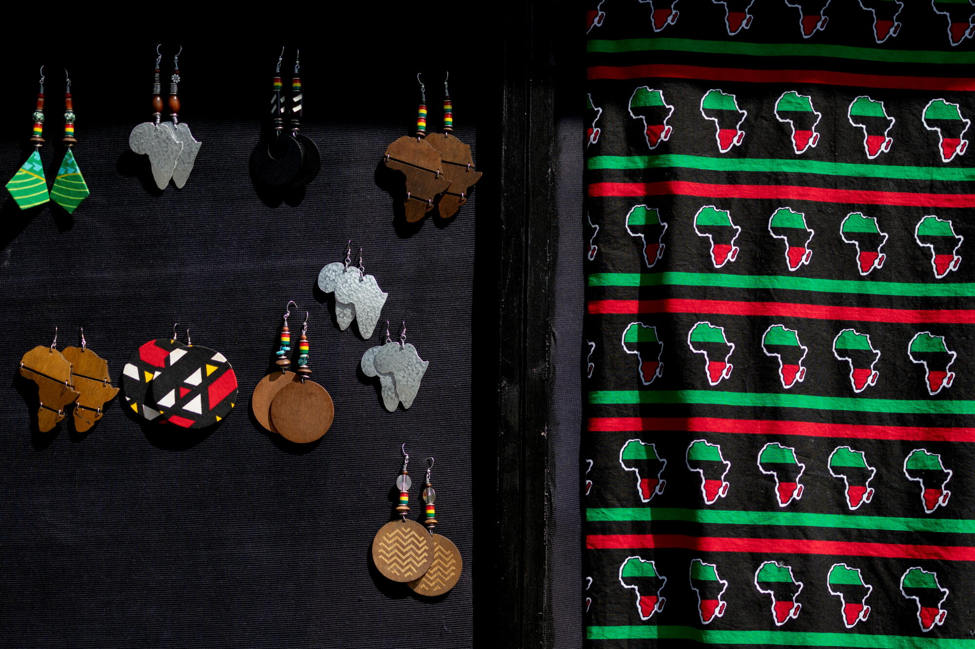 Earrings are seen for sale during a weekly market in Leimert Park.