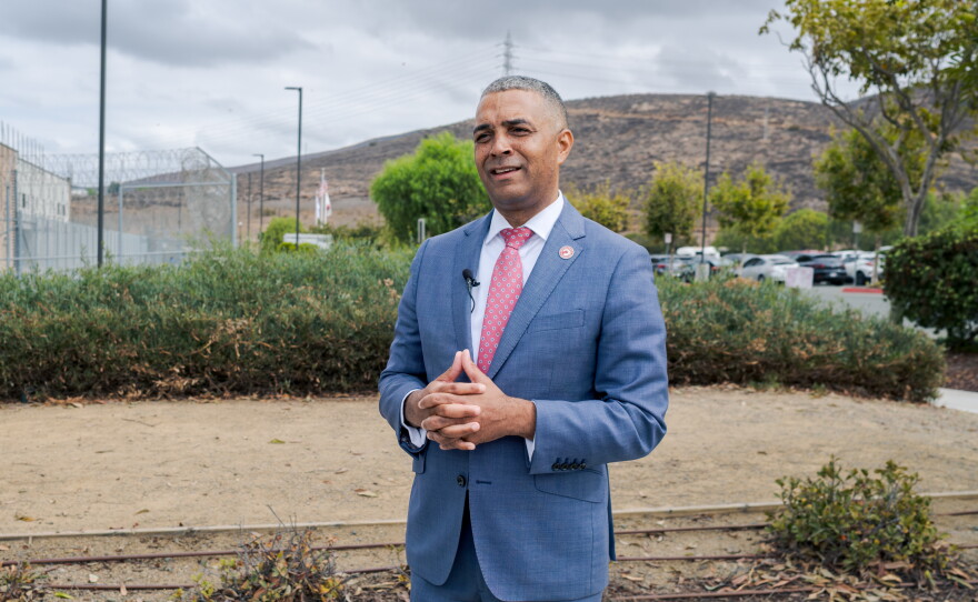 San Diego City College President Ricky Shabazz stands in front of Otay Mesa Detention Center after a student's hearing, Sept. 17, 2026.