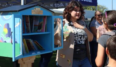 Former Centralia Elementary School District student Sarah Barron speaks to students at San Marino Elementary School about the new free library available on their campus. (Centralia Elementary School District)
