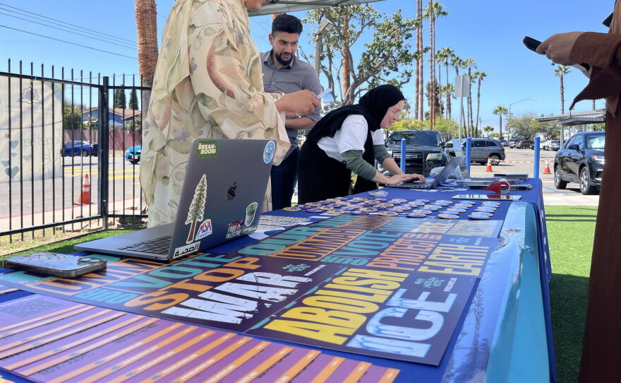 Organizers prepare voter registration materials outside of Islamic Center of San Diego, Sept. 18, 2026.