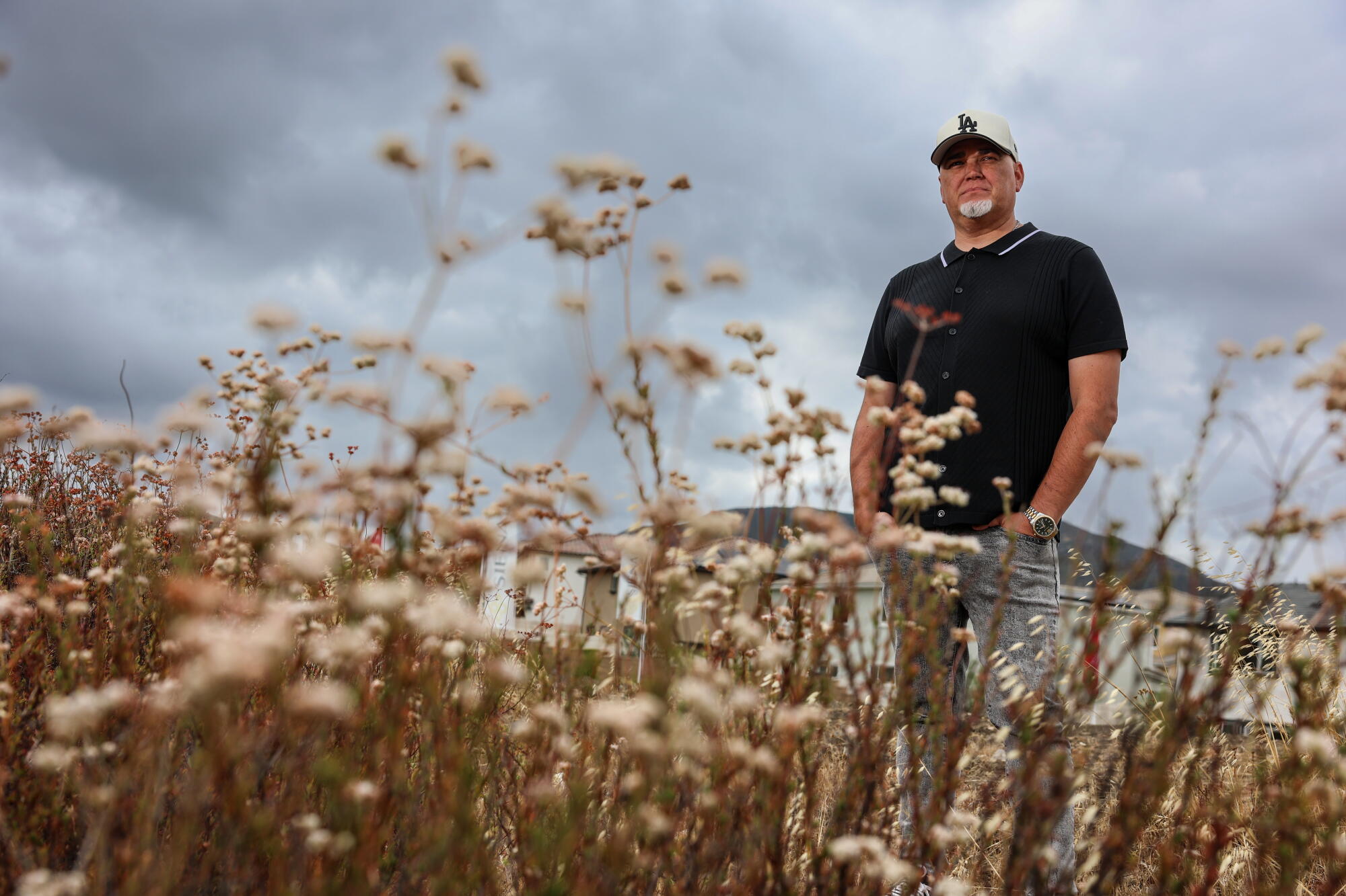 Real estate agent Mike Debelak is photographed at the Siena Homes development in Winchester.