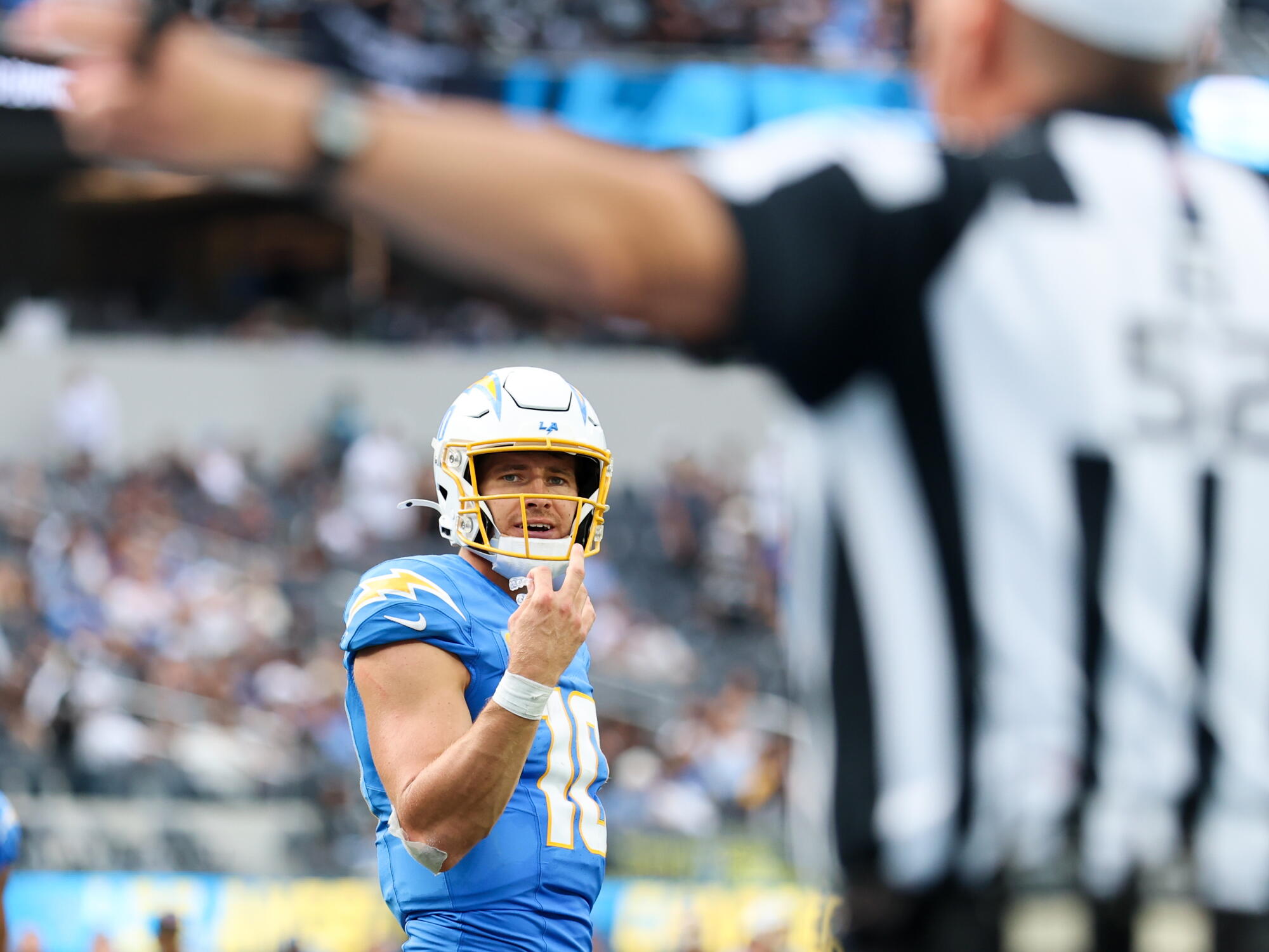 Chargers quarterback Justin Herbert reacts after an offensive holding penalty on Joe Alt results in a safety.