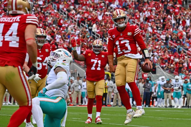San Francisco 49ers starting quarterback Brock Purdy (13) celebrates after scoring a touchdown against the Miami Dolphins in the second quarter of their NFL game at Levi's Stadium in Santa Clara, Calif., on Sunday, Sept. 20, 2026. (Jose Carlos Fajardo/Bay Area News Group)