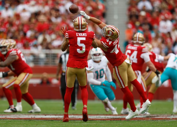San Francisco 49ers' Mike Evans (5) makes a catch in front of San Francisco 49ers' Kyle Juszczyk (44) against the Miami Dolphins in the third quarter at Levi's Stadium in Santa Clara, Calif., on Sunday, Sept. 20, 2026. (Nhat V. Meyer/Bay Area News Group)