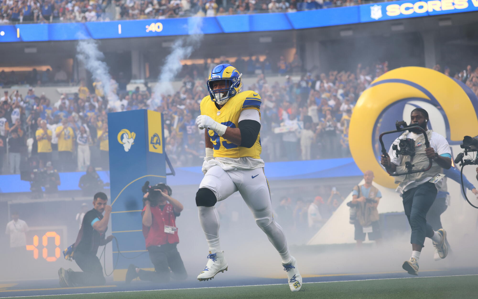 Rams defensive tackle Aaron Donald runs onto the field during player introductions.